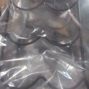 Wrought iron bottle rack (holds 6 bottles)